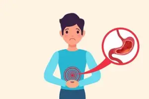 Ilustrasi seorang pria memegang perutnya dengan ekspresi kesakitan, menunjukkan gangguan lambung. Terdapat inset gambar organ lambung dengan luka atau tukak lambung sebagai penyebab nyeri.